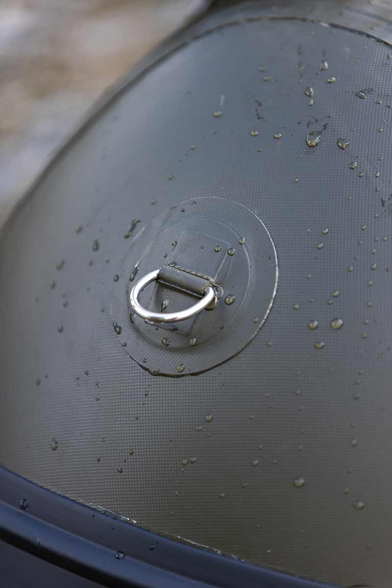 Close-up of the Barca Fox 320x Airdeck with a sturdy ring and water droplets on the durable surface.