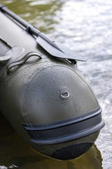 Close-up of the Barca Fox 320x Airdeck inflatable boat on water, showcasing its durable design and features.
