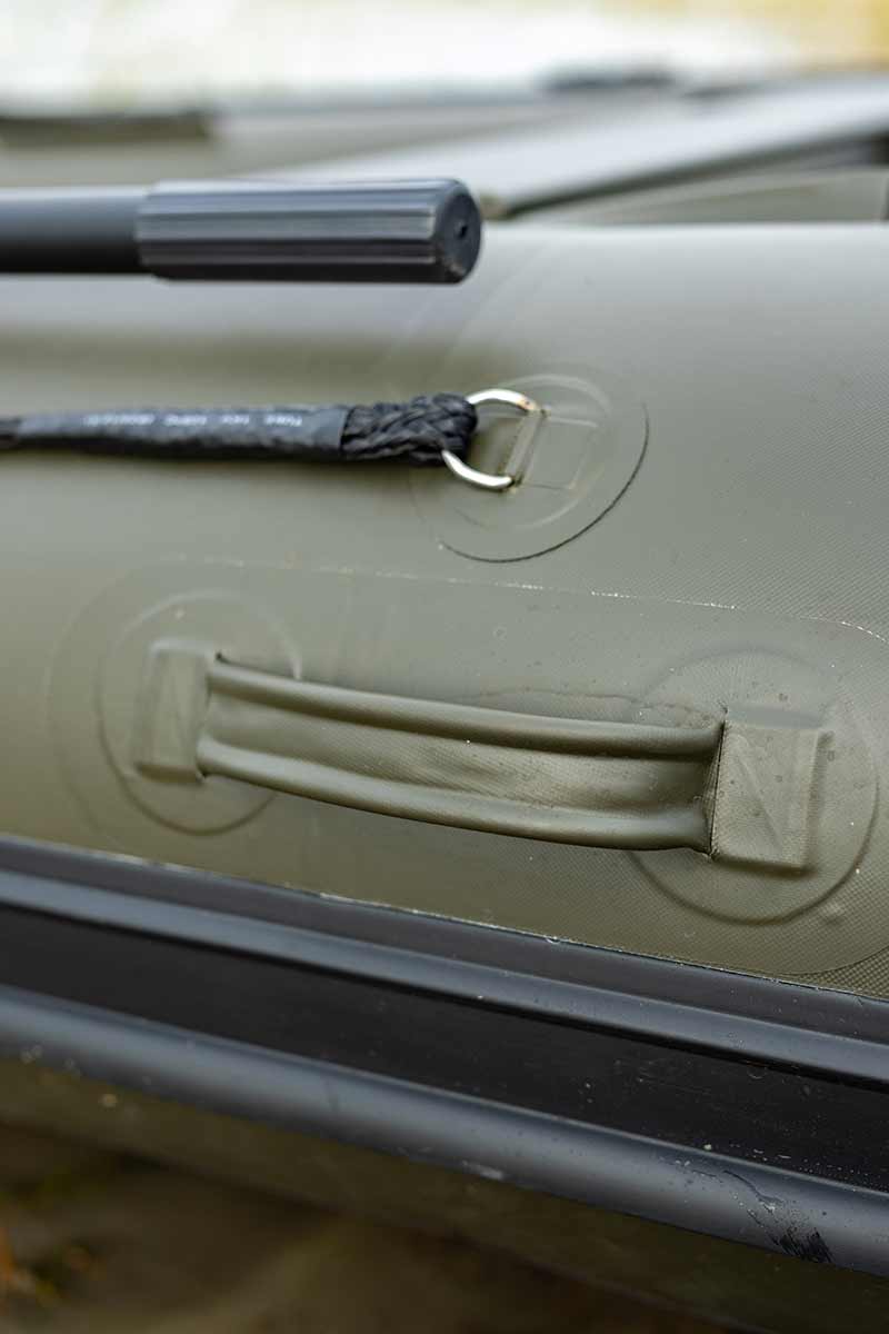 Detail of the Barca Fox 320x Airdeck inflatable boat handle and attachment points for stability and ease of use.