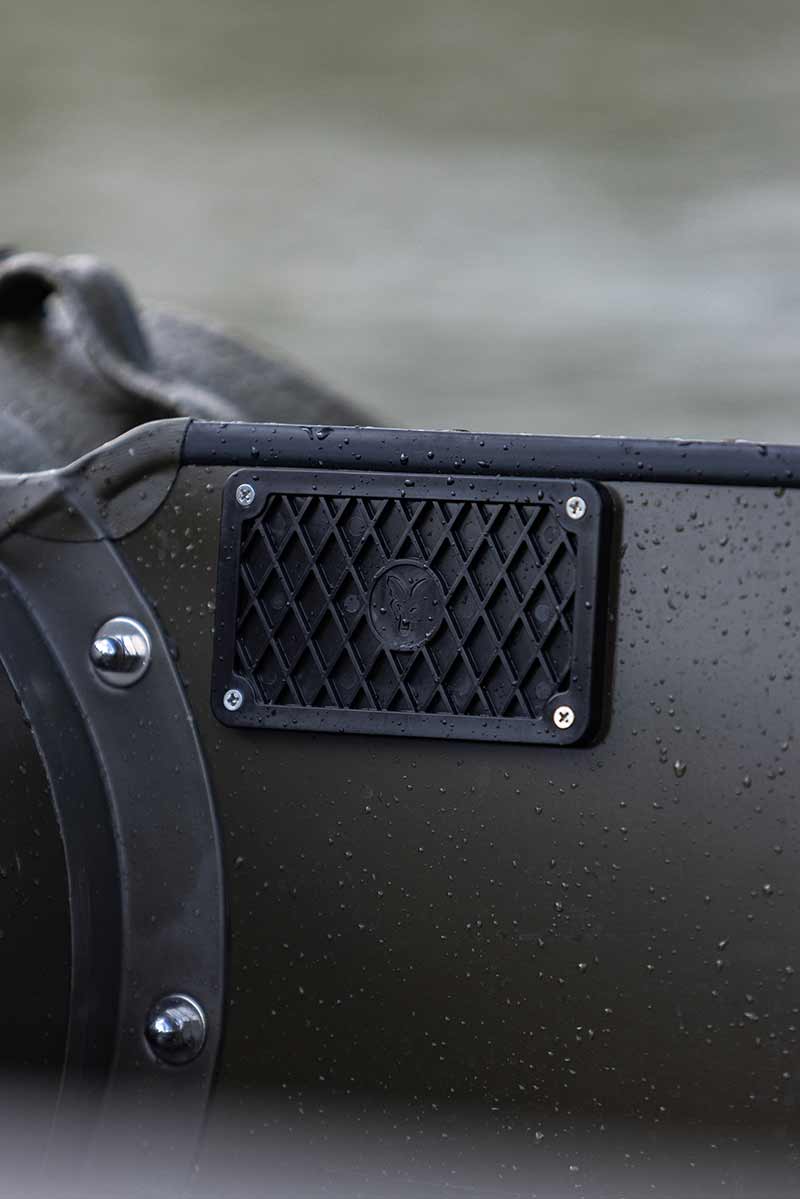 Close-up of a waterproof speaker mounted on the side of a Barca Fox inflatable boat.