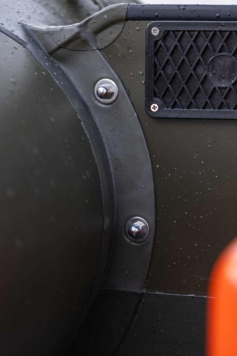 Close-up of Barca Fox 320x Airdeck inflatable boat detailing with water droplets.