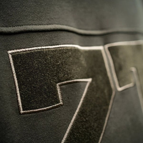 Sudadera Nash ZT Wind Chill Varsity - Tienda Carpfishing